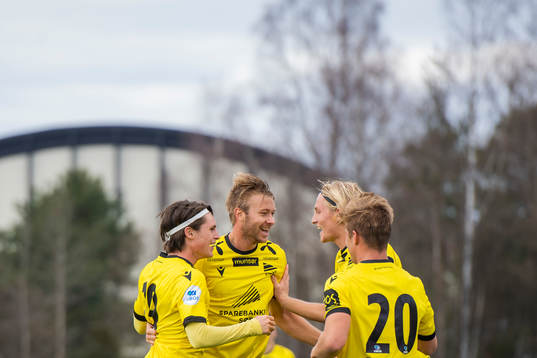 Kasper Skaanes of Start celebrates with his teammates after scoring 0-2