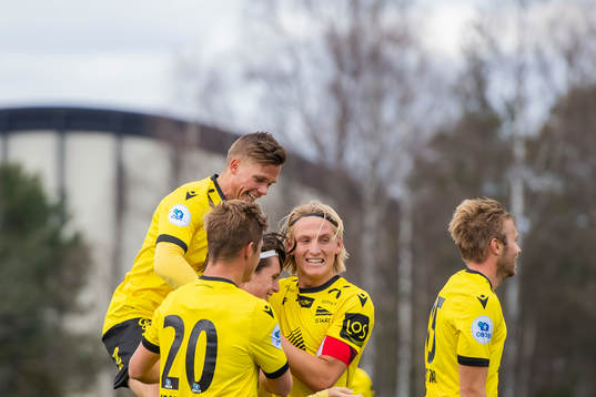 Kasper Skaanes of Start celebrates with his teammates after scoring 0-2
