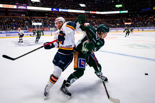 Djurgårdens Dick Axelsson och Färjestads Joakim Nygård