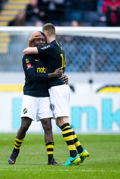 s Chinedu Ogbuke Obasi jublar Karol Mets efter 1-1 under fotbollsmatchen i Allsvenskan mellan AIK och Sirius den 14 april 2019 i Stockholm. 

