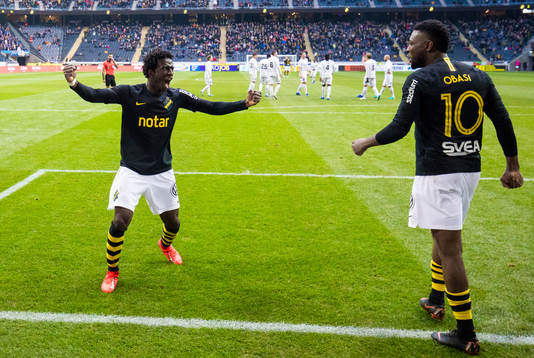 s Jack Lahne (v) jublar med Chinedu Ogbuke Obasi (h) efter 2-1 under fotbollsmatchen i Allsvenskan mellan AIK och Sirius den 14 april 2019 i Stockholm. 