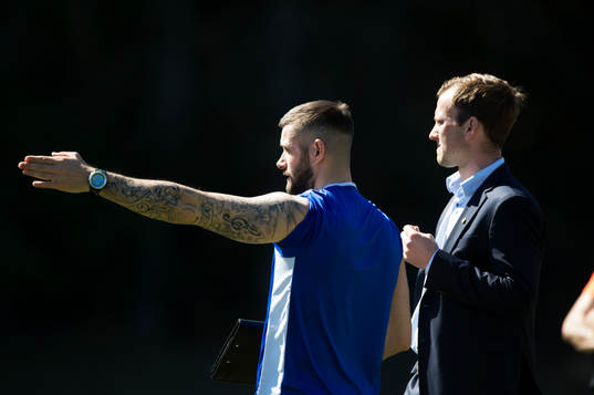 IFK Hässleholms tränarduo Chadie Hotait och Jonas Jönsson i matchen i division 2 mellan Älmeboda/Linneryd och IFK Hässleholm i Rävemåla april 2019.  