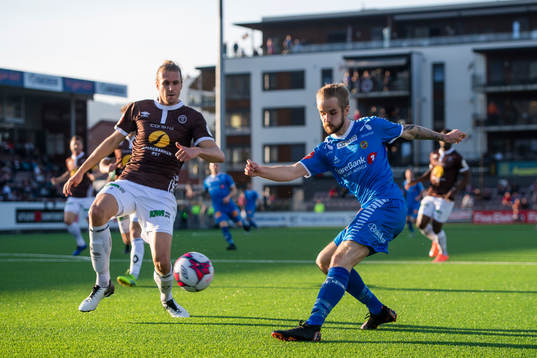 Quint Jansen of Mjøndalen and Daniel Berntsen of Tromsø