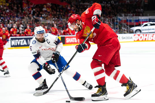 Jonas Holøs of Norway and Alexander Ovechkin of Russia