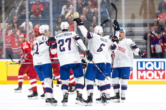 Jonas Holøs of Norway celebrate with Christian Bull ,