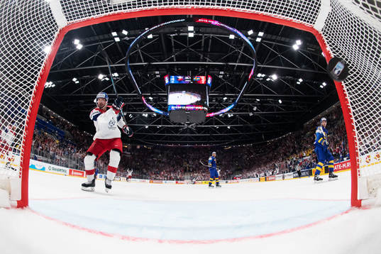 Michal Repik of Czech Republic hits the puck