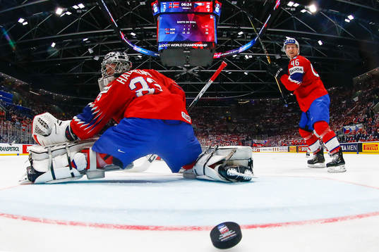 Goaltender Henrik Haukeland of Norway lets in the 1-5 goal