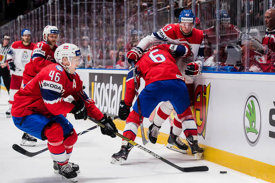 Patrick Thoresen, Mathis Olimb and Jonas Holøs in against