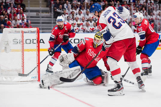 Jonas Holøs, goaltender Henrik Holm and Mathis Olimb