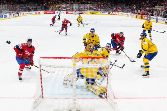 Michael Haga and Mathias Trettenes in action against