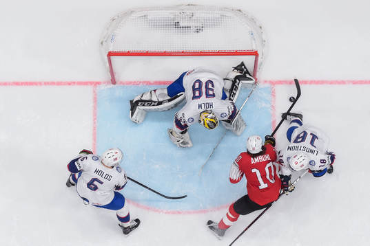 Jonas Holøs, goaltender Henrik Holm and Tobias Lindström
