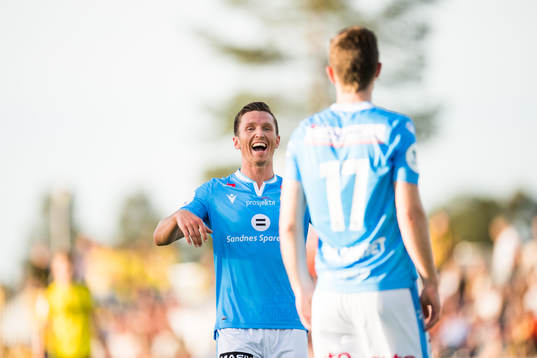Daniel Edvardsen and Ingvald Halgunset of Sandnes Ulf celebrate