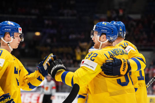 Elias Pettersson and Gabriel Landeskog of Sweden celebrates