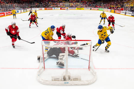 William Nylander of Sweden scores 2-1 behind Nico Hischier,