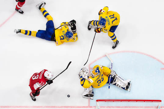 Nico Hischier of Switzerland in action against John