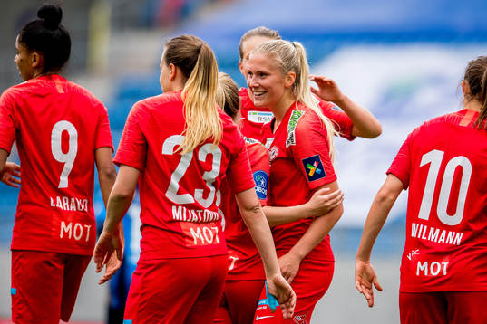 Emilie Nautnes of Arna-Bjørnar celebrates with teammates after scoring 0-1