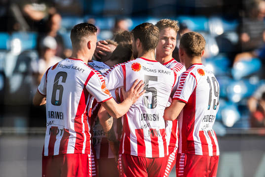 Kent-Are Antonsen of Tromsø celebrate with teammates after 0-1