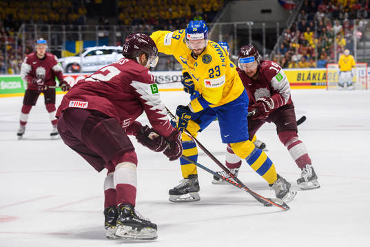 Oliver Ekman Larsson of Sweden against Janis Jaks and