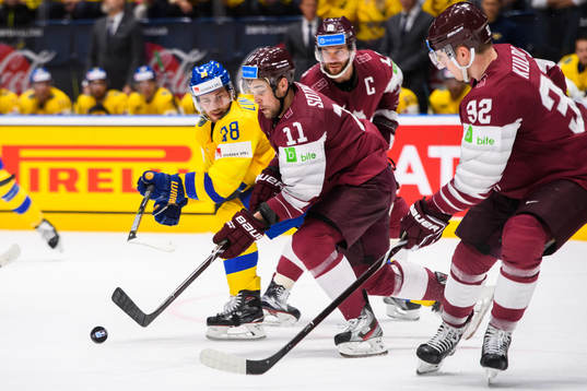 Elias Lindholm of Sweden against Kristaps Sotnieks and