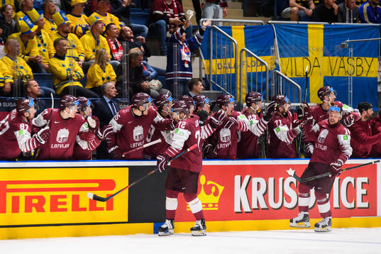 Janis Jaks and Rihards Bukarts celebrates with the bench