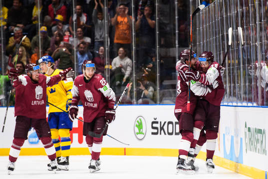 Lauris Darzins and Janis Jaks of Latvia celebrates