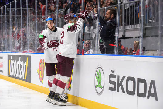 Janis Jaks and Uvis Balinskis of Latvia celebrate