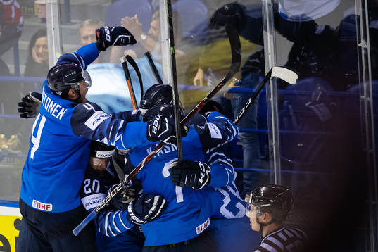 Marko Anttila of Finland celebrates with his teammates