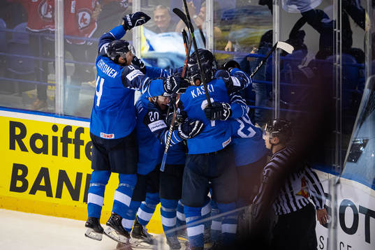 Marko Anttila of Finland celebrates with his teammates