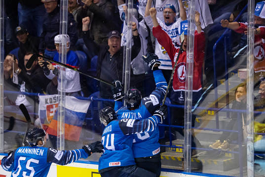 Marko Anttila of Finland celebrates with his teammates