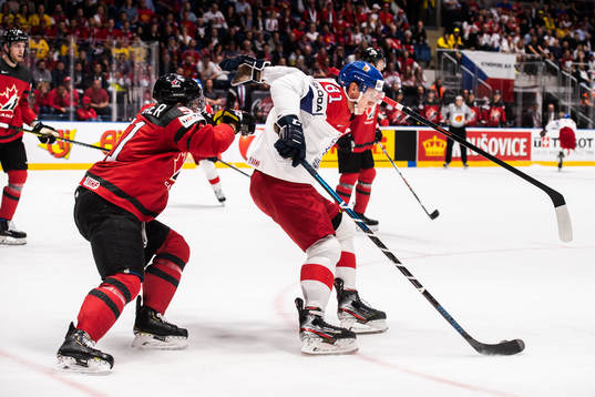 Troy Stecher of Canada and Dominik Kubalik of Czech Republic