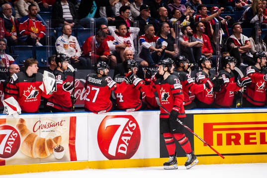 Thomas Chabot of Canada celebrate with teammates