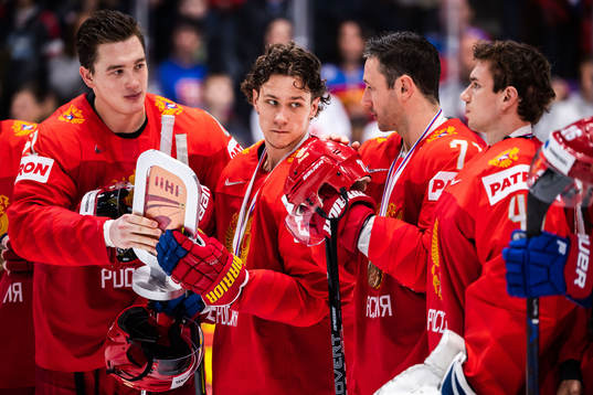 Nikita Zadorov and Ilya Kovalchuk of Russia with the trophy