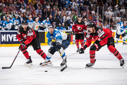 Shea Theodore and Anthony Mantha of Canada against Juho
