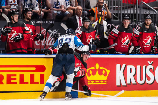 Harri Pesonen of Finland and Anthony Mantha of Canada
