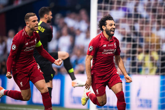 Mohamed Salah of Liverpool celebrates scoring 0-1