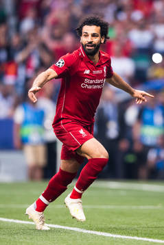 Mohamed Salah of Liverpool celebrates scoring 0-1
