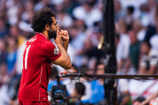 Mohamed Salah of Liverpool celebrates scoring 0-1