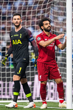 Goalkeeper Hugo Lloris of Tottenham and Mohamed Salah of