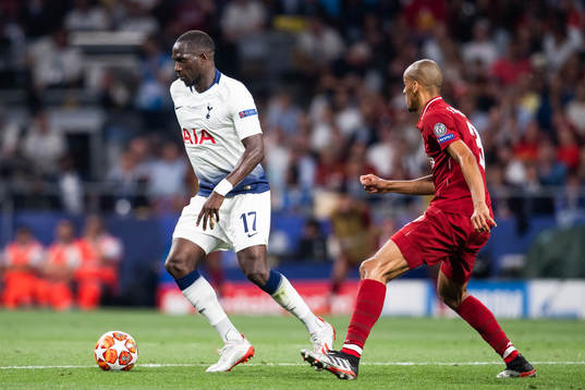 Moussa Sissoko of Tottenham and Fabinho of Liverpool