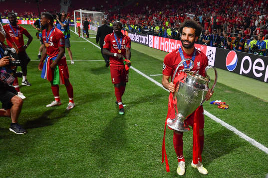 Mohamed Salah of Liverpool celebrate with the trophy
