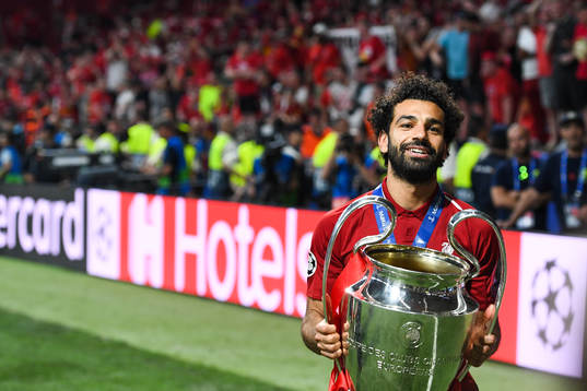 Mohamed Salah of Liverpool celebrate with the trophy