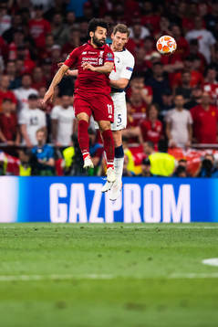 Mohamed Salah of Liverpool and Jan Vertonghen of Tottenham