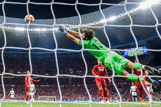 Goalkeeper Alisson Becker of Liverpool makes a save