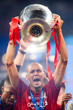 Fabinho of Liverpool celebrate with the trophy