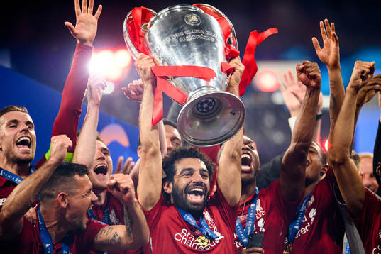 Mohamed Salah of Liverpool celebrate with the trophy
