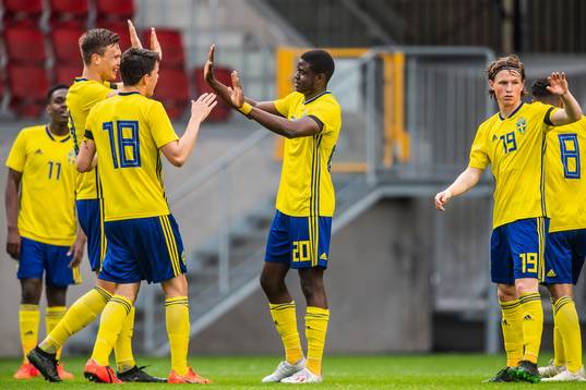 Benjamin Mbunga Kimpioka celebrate with Samuel Adrian and