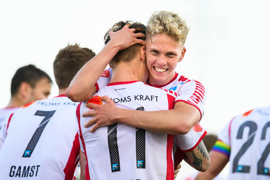 Robert Taylor of Tromsø celebrates with teammate Onni Valakari after his 0-1 goal during the Eliteserien football match between Stabæk and Tromsø on June 17, 2019 in Bekkestua.
