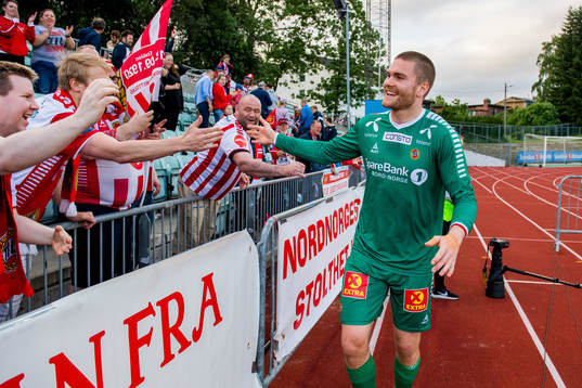Goalkeeper Gudmund Kongshavn of Tromsø celebrates