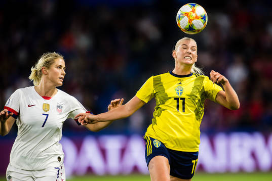Abigail Dahlkemper of USA and Stina Blackstenius of Sweden