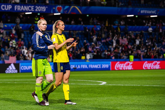Goalkeeper Hedvig Lindahl and Amanda Ilestedt of Sweden
